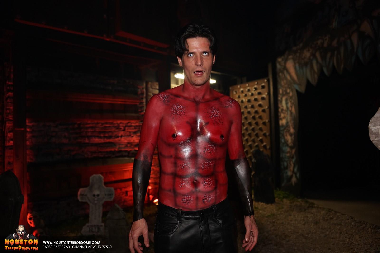 Devil Shows off his airbrushed Abs