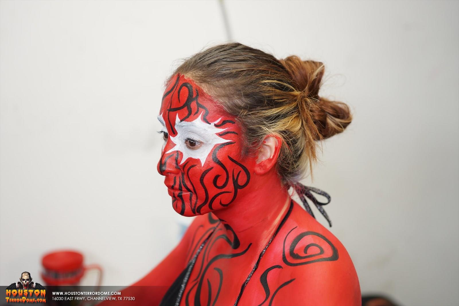 Side view of body paint on a dancer.