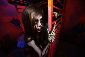 Skelton girl inside the haunted house. 